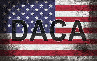 the letters daca on an american flag