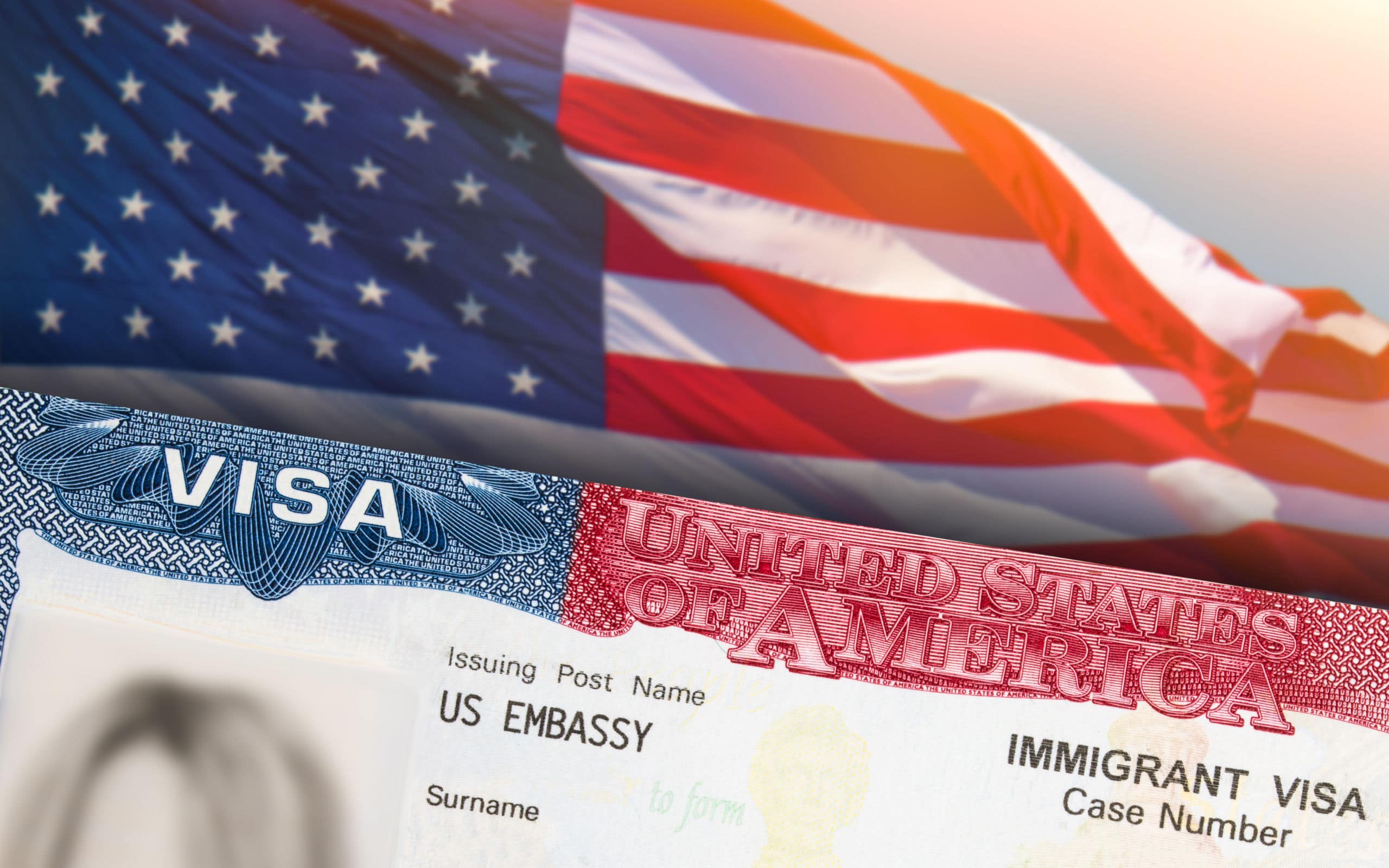 a US visa next to the american flag